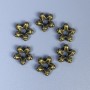 Bead insert finding, bronze metal colour, diameter 11x4mm+/-, hole diameter 3mm+/-, pack of 20 pcs