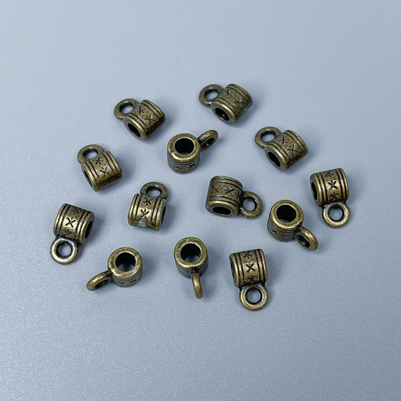 Bail Findings, Bronze Metal Colour, Size 9x5x5mm+/- Holes Diameter 2.5mm+/- and 2mm+/-, Pack of 34