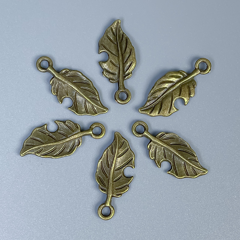 Leaf Pendant Finding, Bronze Metal Colour, Size 23x10x1mm +/-, Hole Diameter 2mm +/-, Pack 20g (~26pcs)