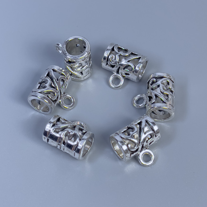 Bead bail, metal color silver, size 11×8×11 mm±, holes 5 mm± and 2 mm±, packaging 14 pcs
