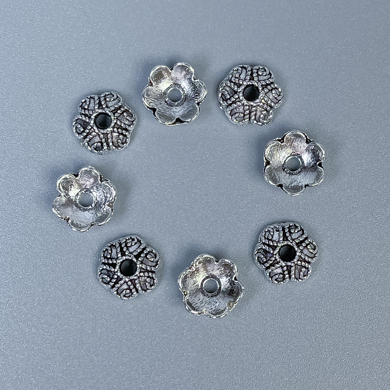 Bead cap finding, silver metal colour, diameter 7x1mm+/-, hole diameter 2mm+/-, pack 20g (~80 pcs)