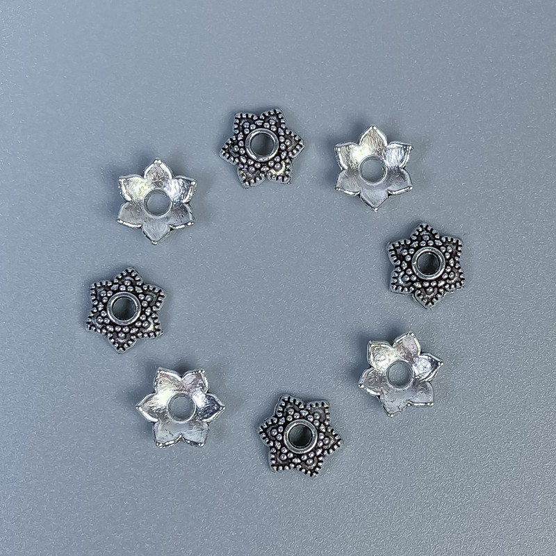 Bead cap finding, silver metal colour, diameter 7x1mm+/-, hole diameter 2mm+/-, pack 20g (~88 pcs)