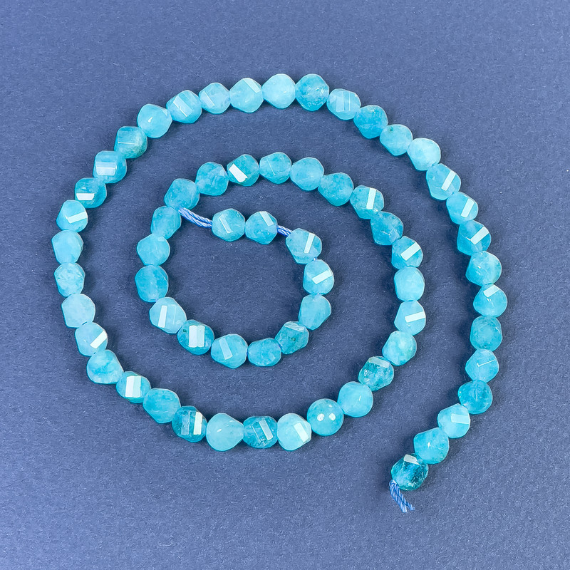 Aquamarine Faceted Rhombus Beads 6x5mm+ – on a strand, length 39cm+