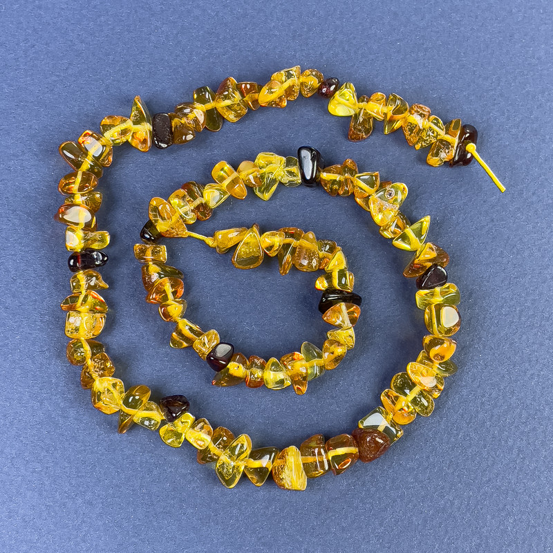Amber Chip Beads 5-9x4mm+/- on Thread, Length 39cm+