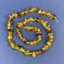 Amber Chip Beads 5-9x4mm+/- on Thread, Length 39cm+