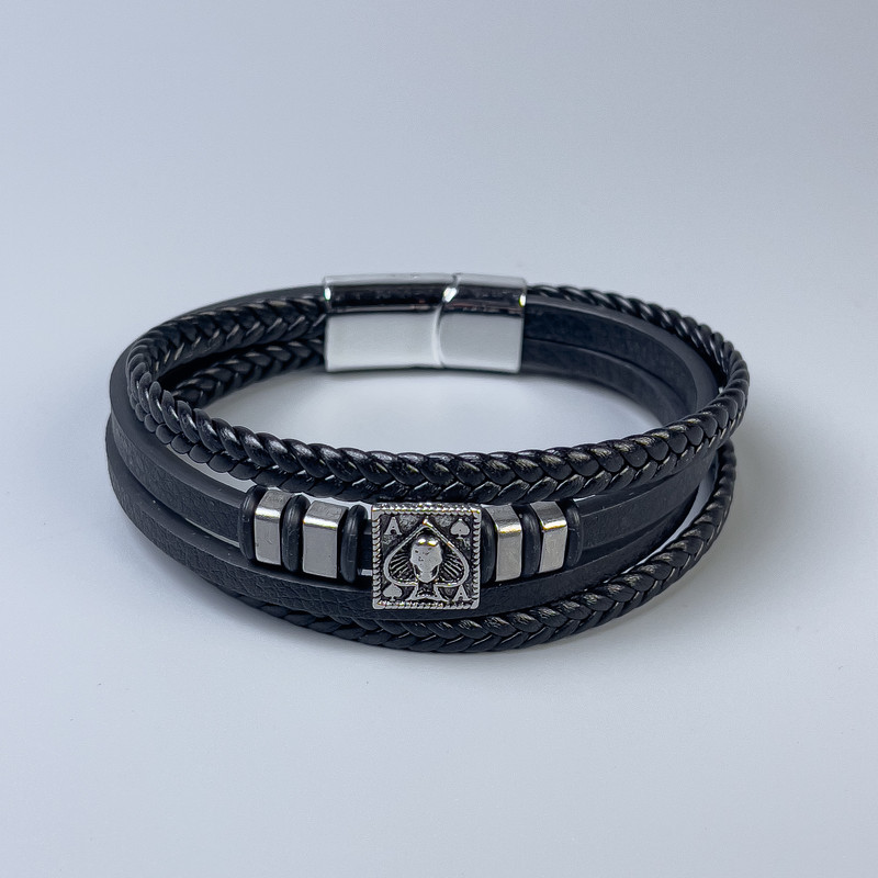 Men's bracelet in black eco-leather with metal inlays, thickness 12-25mm ±, length 22cm ±, silver-toned metal on clasp