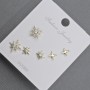 Stud Earrings 10-6mm± golden metal with white crystals