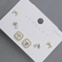 Stud Earrings in Gold Tone Metal with White Crystals – Clover 10mm+