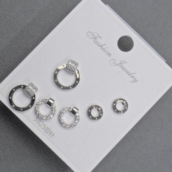 Earrings, stud, silvered metal with white crystals