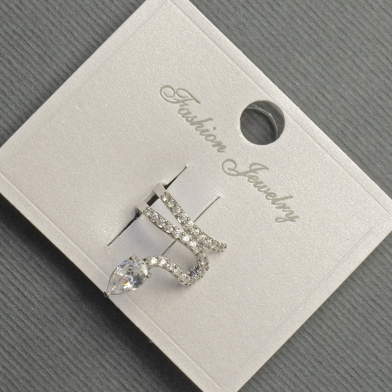 Ear stud Cafe 'Snake' on-ear with silver metal 12x14mm± white rhinestones