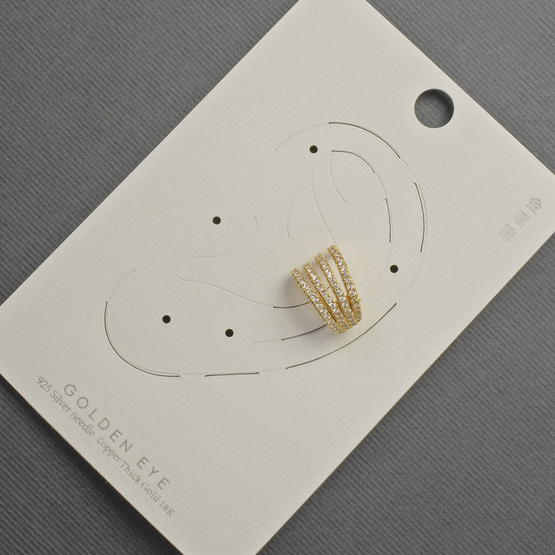 Earring Caf on ear stud with golden metal 10x14mm± white crystals
