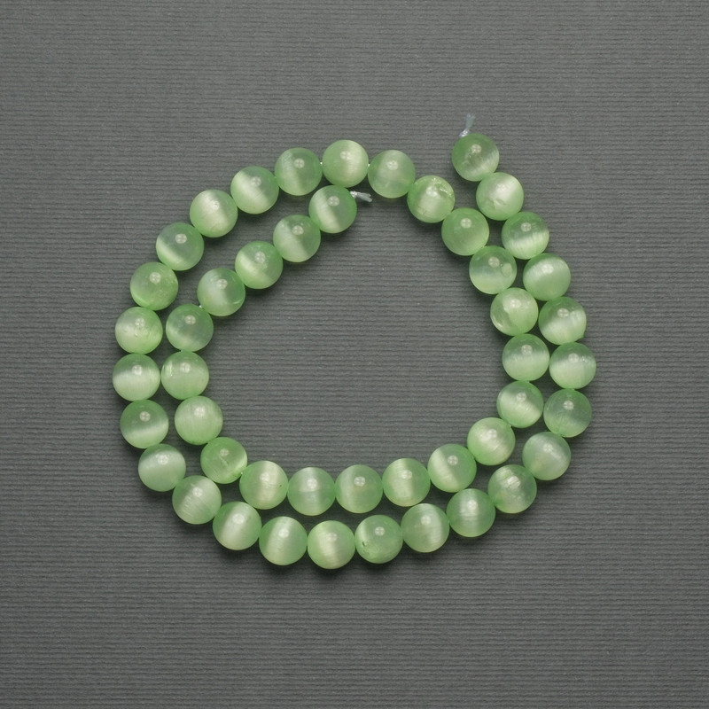 Cat's Eye Beads greenish synthetic stone smooth sphere, diameter 8mm ± on thread, length 39cm+