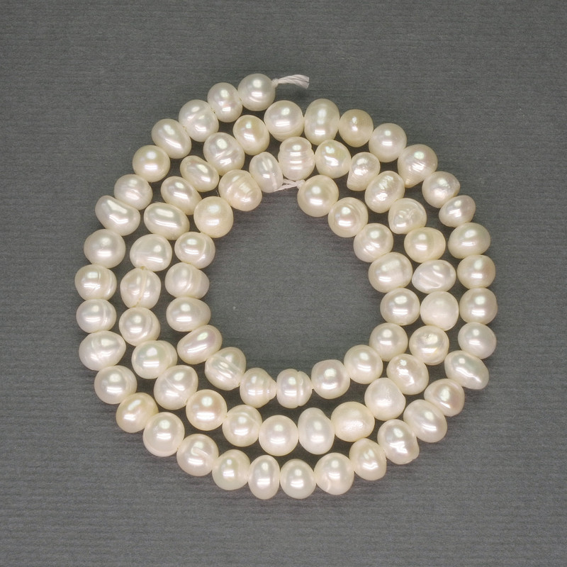 River White Oval Pearls on Strand, diameter 5x5-5.5mm+/-, length 35cm+