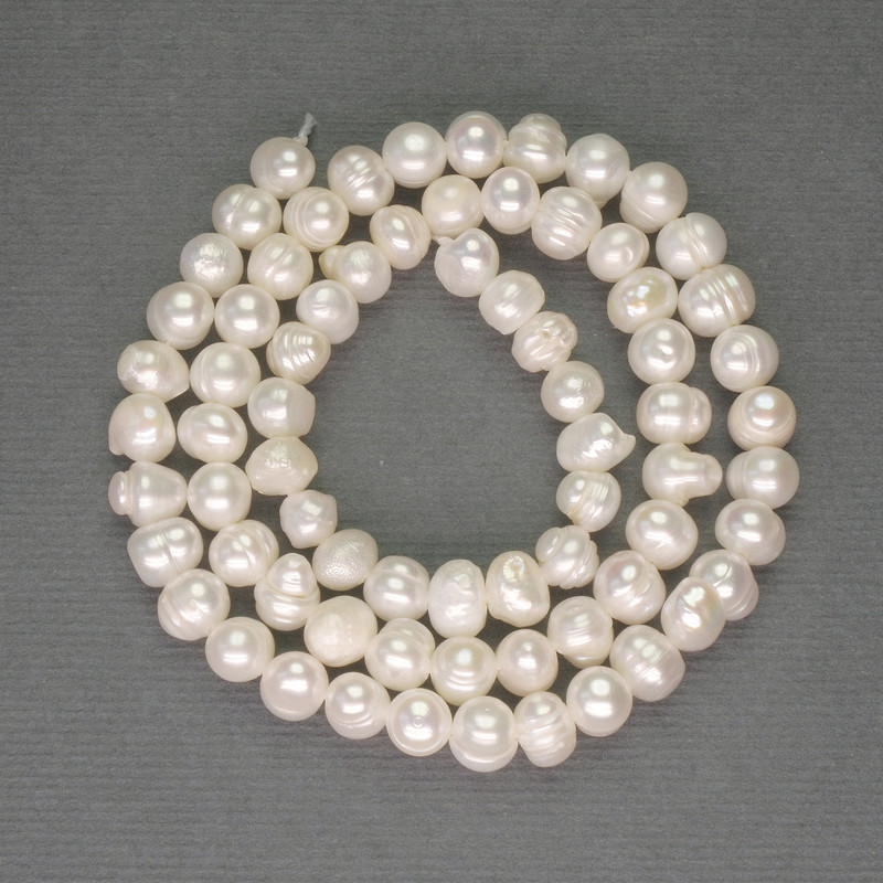 River White Oval Pearls on Strand, diameter 5-5.5x5.5-6mm+/-, length 35cm+