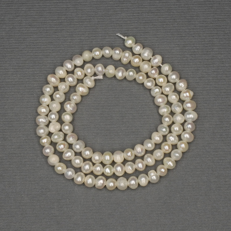 Freshwater white oval pearls on a thread, diameter 4x3.5mm± on thread, length 36cm+