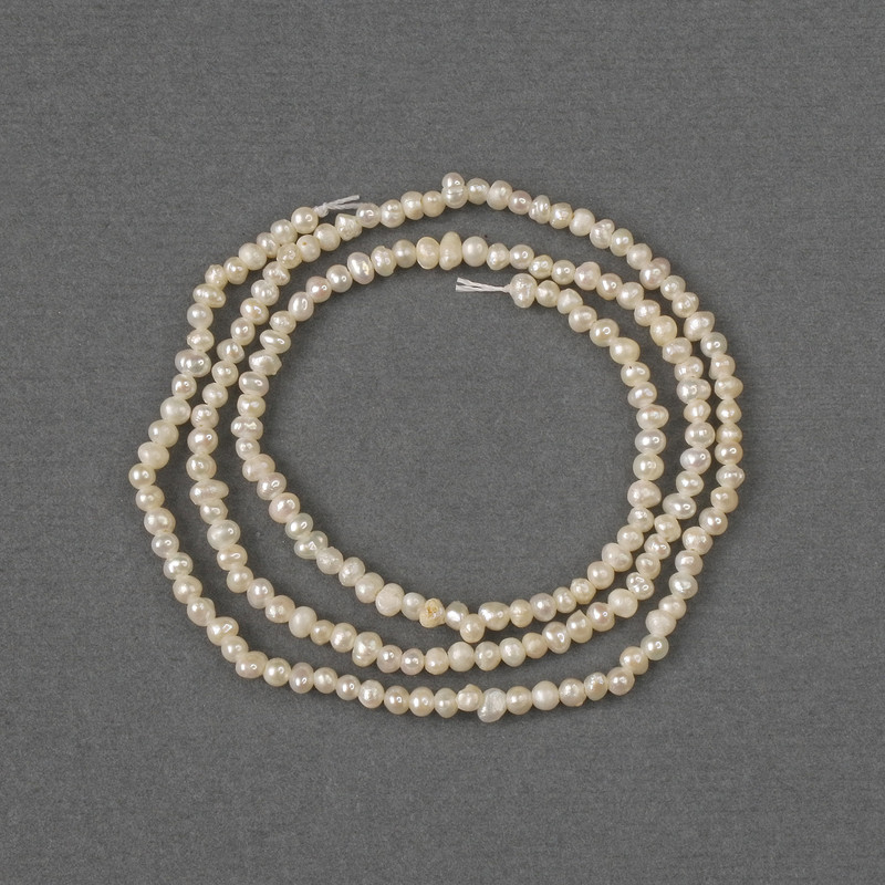 Natural River Pearl Beads 2-2.5x2mm+-, length 35cm+- on a thread