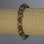 Tiger's Eye Bracelet, tumbled 8-10x5mm+-, length 18cm+- with 3mm+- seed beads, stretch