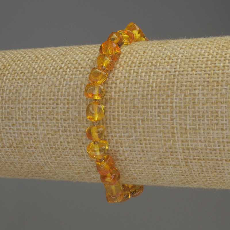 Amber Bracelet, tumbled beads 7x5mm+- with seed beads 2mm+-, length 18cm+- stretch