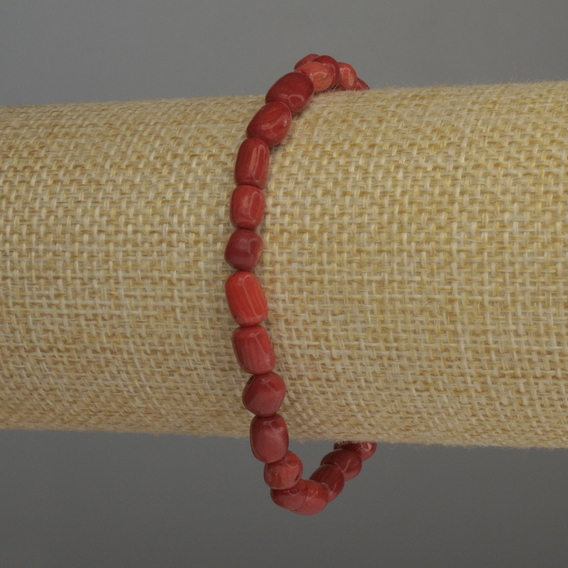 Coral Bracelet tumbled, diameter 6-7x5mm+/-, length 18cm stretch