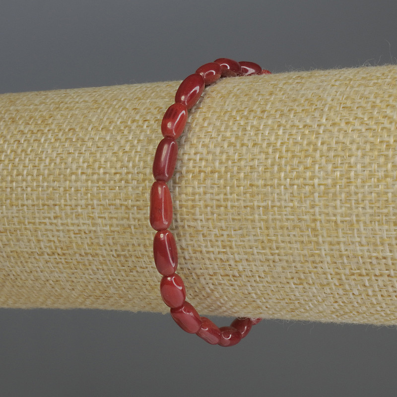Bracelet Coral Grain, diameter 10x5mm+-, length 18cm stretch