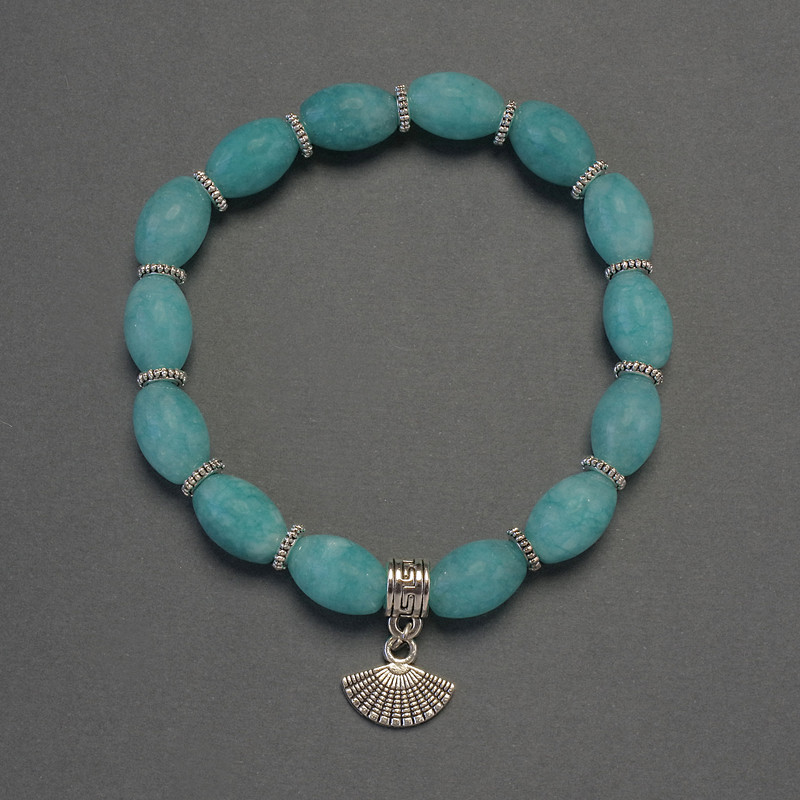 Aquamarine Grain Bracelet, diameter 12x8mm+/- with metal inserts, length 18cm+/- stretch