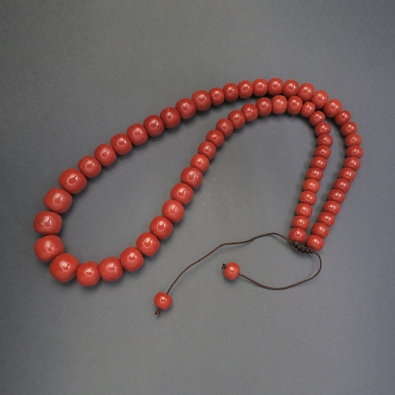 Necklace Coral (Imitation), smooth rondelle, diameter 10-16mm+- graduated, length 66cm+- drawstring cord
