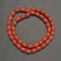 Orange Coral (Imitation) Barrel Beads, diameter 8.5x6mm+-, length 40cm+- on fishing line