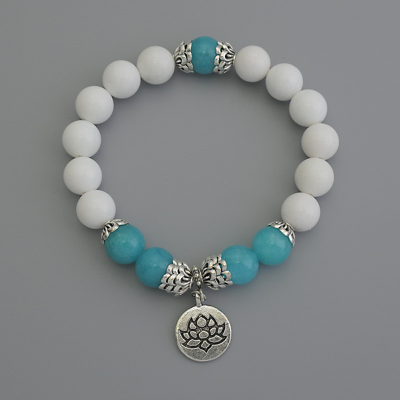 Assorted Stones Bracelet, smooth round beads, diameter 10mm+/- with metal inserts, length 18cm stretch