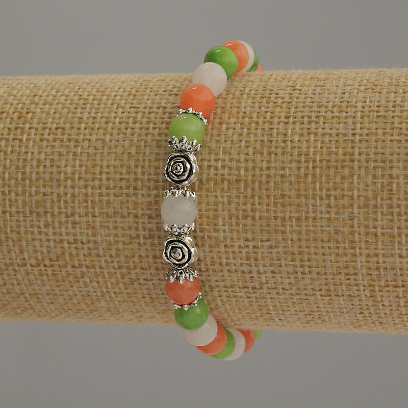 Assorted Bracelet, smooth beads, diameter 6mm+/- with metal inserts, length 18cm stretch