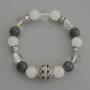 Assorted Bracelet, smooth beads, diameter 10mm+/- with metal inserts, length 18cm stretch