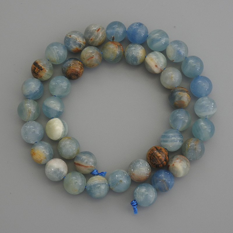 Blue Calcite Beads, smooth round 10mm+/- on a strand, length 39cm+