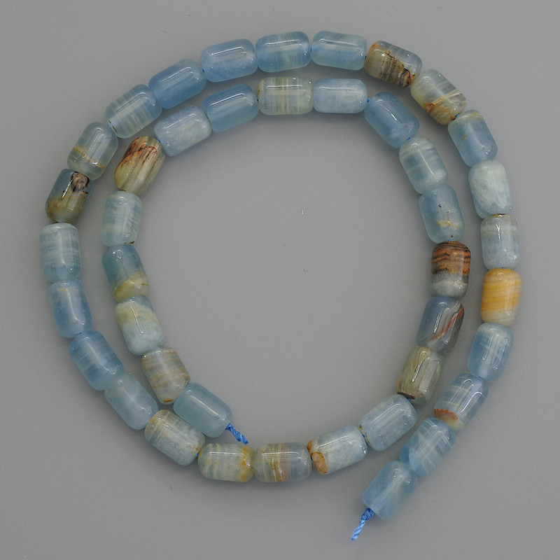 Blue Calcite Beads cylinder 9x6mm+/- on a strand, length 39cm+