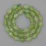 Beads Natural Stone Chrysolite Olivine Faceted Grain, diameter 8x6mm+- seed beads 3mm+-, length 37cm+
