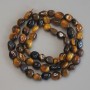Tiger's Eye Tumbled Beads, diameter 6-10x7mm+-, length 40cm+- on thread