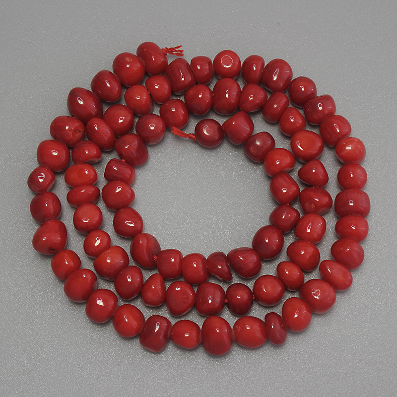 Coral Tumbled Beads, diameter 6x5mm+/-, length 41cm+/- on a strand