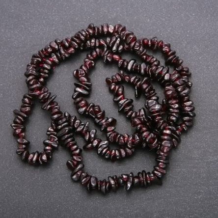 Garnet Chip Beads, diameter 5-9x3-3.5mm+-, length 80cm+- on a thread