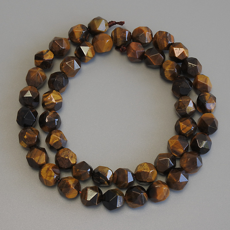 Tiger's Eye Beads, faceted, diameter 8x7.5mm+/-, length 37cm+/- on a strand