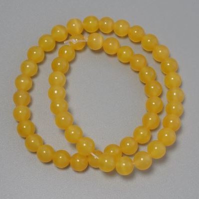 Cat's Eye Beads, orange synthetic stone, smooth round, diameter 8mm +/-, on fishing line, length 37cm+