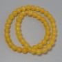 Cat's Eye Beads, orange synthetic stone, smooth round, diameter 8mm +/-, on fishing line, length 37cm+
