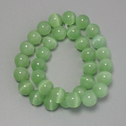 Cat's Eye Beads, light green synthetic stone, smooth round, diameter 11.5mm+/- on fishing line, length 36cm+