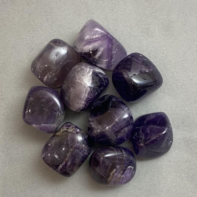 Souvenir Natural Stone Amethyst Tumbled ~ Size 23-26x20-24x20mm (+/-) 100g Pack (price per 100g)