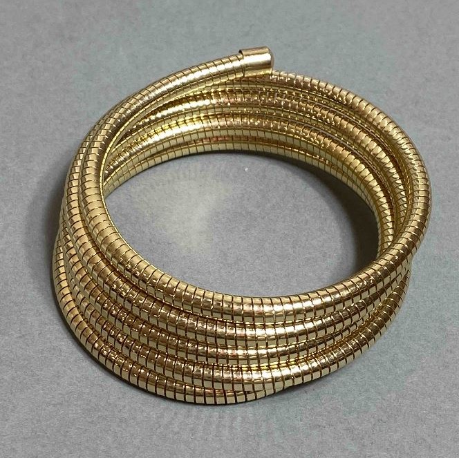 Gold-Tone Flexible Spring Bracelet, diameter 68mm+