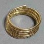 Gold-Tone Flexible Spring Bracelet, diameter 68mm+