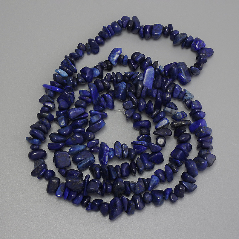 Lapis Lazuli Chip Beads, diameter 7-10x2-6mm+/-, length 80cm+/- on a nylon strand