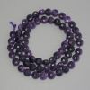 Sugilite Faceted Coin Beads, diameter 6.5mm+/-, length 38cm+/- on a strand