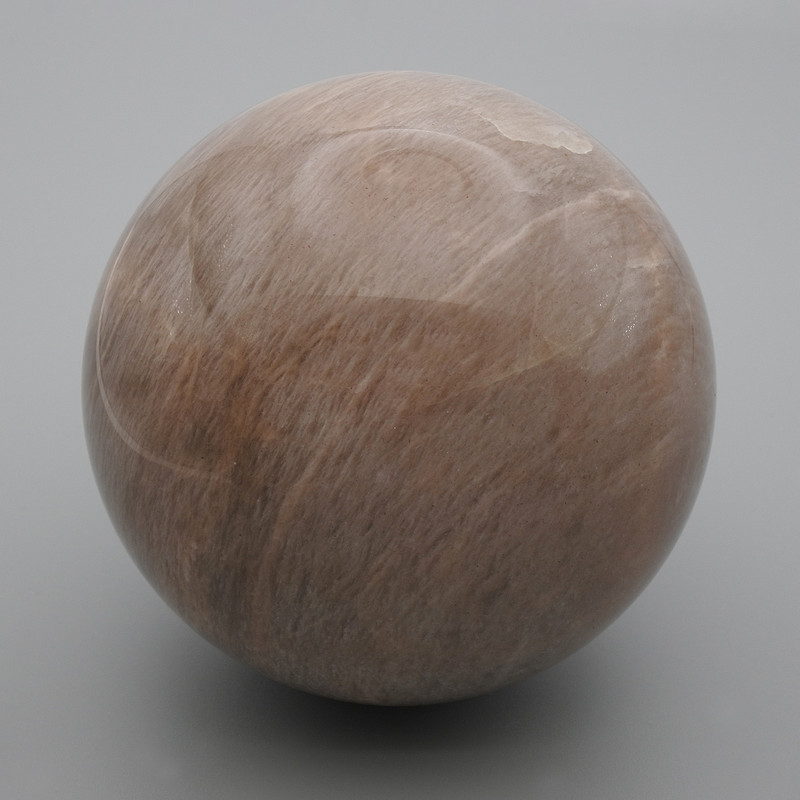 Souvenir Ball made of Natural Sunstone, diameter 65mm+/- weight from 350g (Price per 100g)
