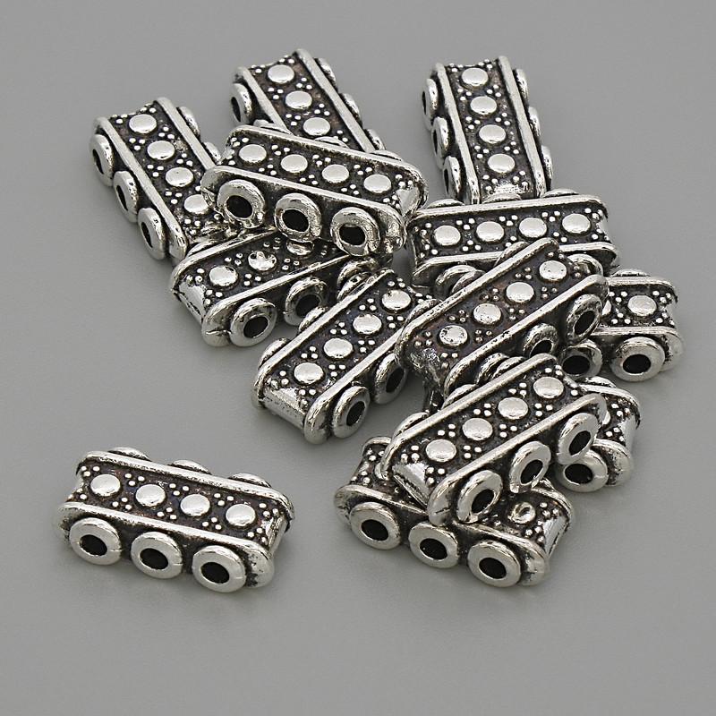 Row spacer finding, silver-tone metal, diameter 14.5x7.5x4mm+-, hole diameter 1.9mm+-, pack 20g (~13pcs)