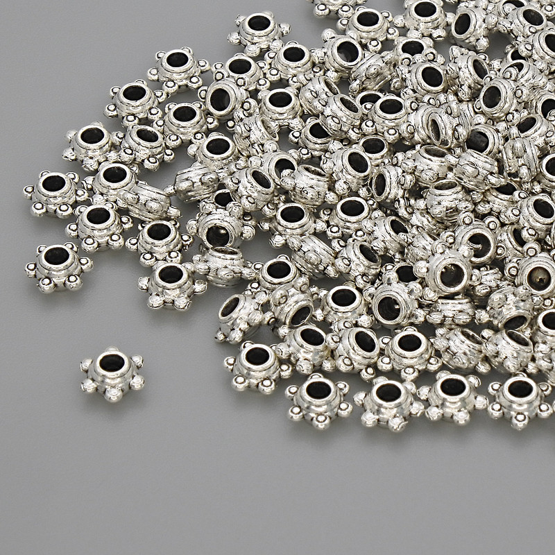 Bead finding, bead inlay, metal colour: silver, diameter 5×2.5 mm, hole approx. 2.8 mm, packaging 20 g (~130 pcs)
