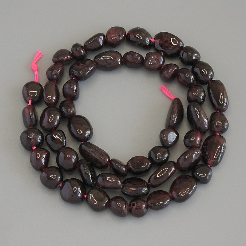 Garnet Tumbled Beads on thread, diameter 8-12x6-8mm+-, length 40cm+