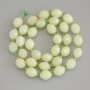 Chrysolite Olivine Faceted Grain Beads, diameter 10x8mm+-, seed beads 3mm+-, on a thread, length 39cm+